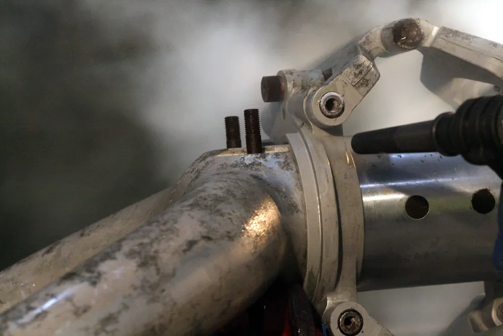 Dry Ice Blaster photo taken from nozzle showing a close up of a metal pipework.